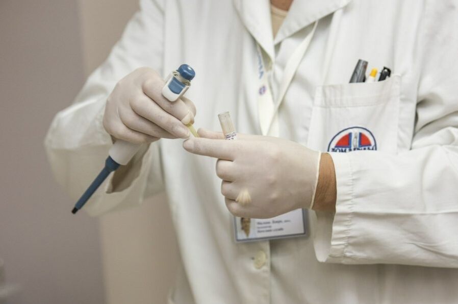 Doctor diagnosing human papillomavirus